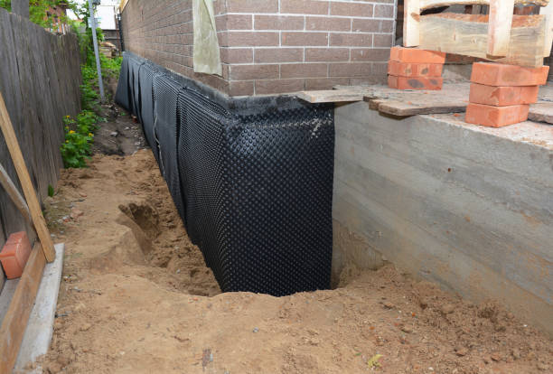 SJ Waterproofing Pros technician performing targeted Basement Waterproofing assessment in Limestone, TN